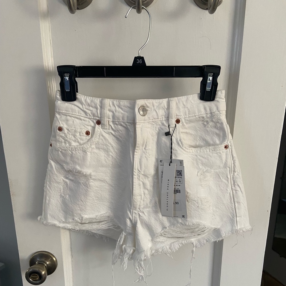 Zara high rise ripped white jean shorts